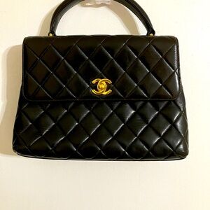 CHANEL Black Quilted lambskin with Gold hardware
